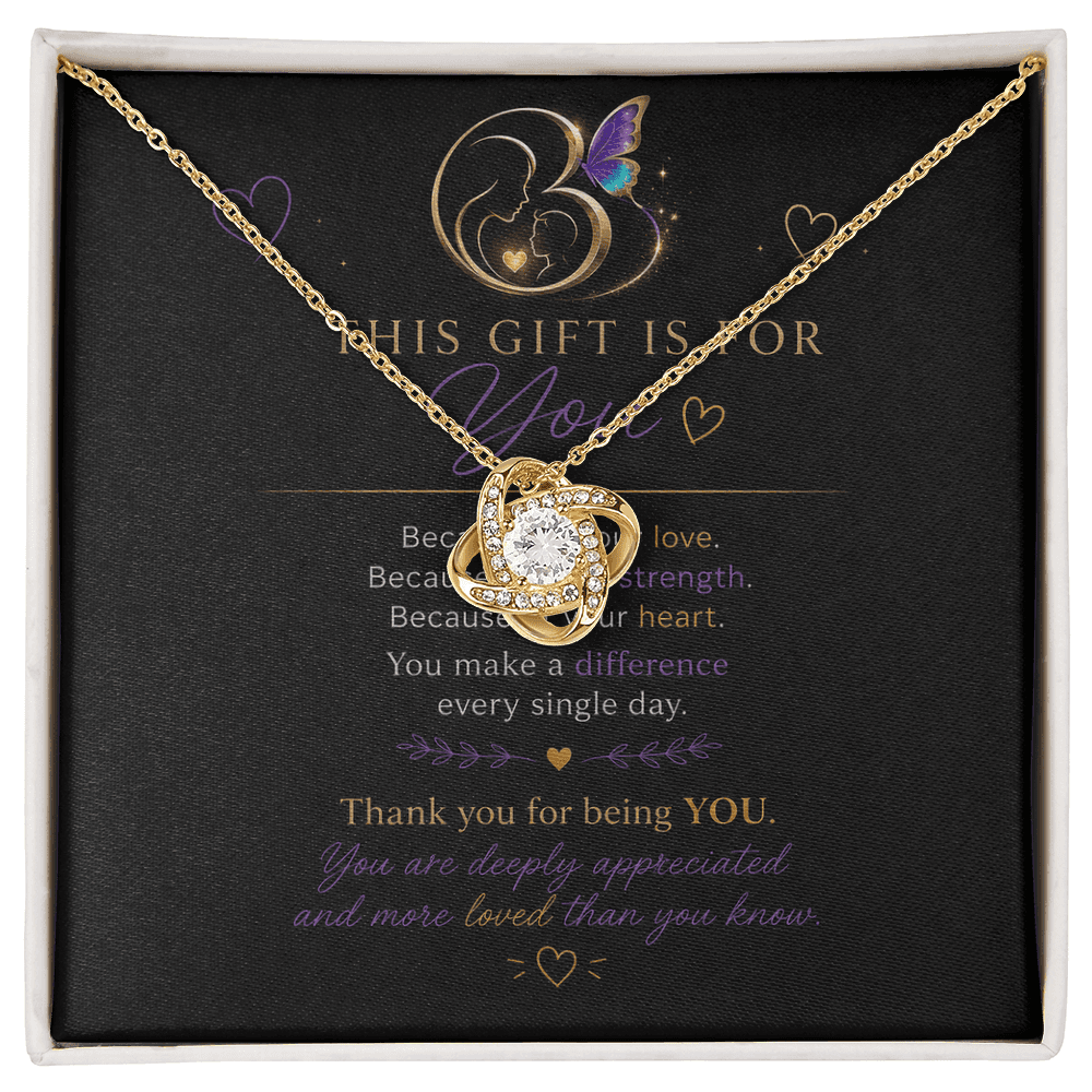 18K yellow gold Eternal Hope Necklace displayed over a heartfelt message card in a premium gift box